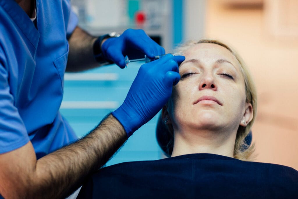 Woman getting neurotoxin injections