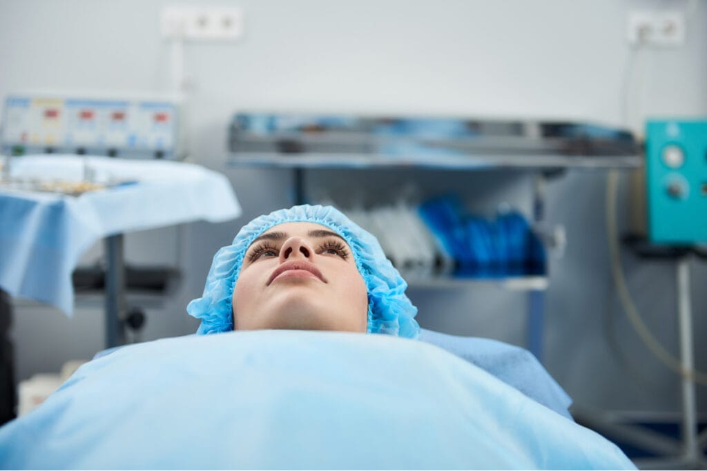 Woman undergoing an awake cosmetic surgery procedure